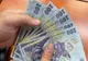 Noi ajutoare pentru români din luna septembrie - Bani pentru mâncare și facturi: cât primesc pensionarii